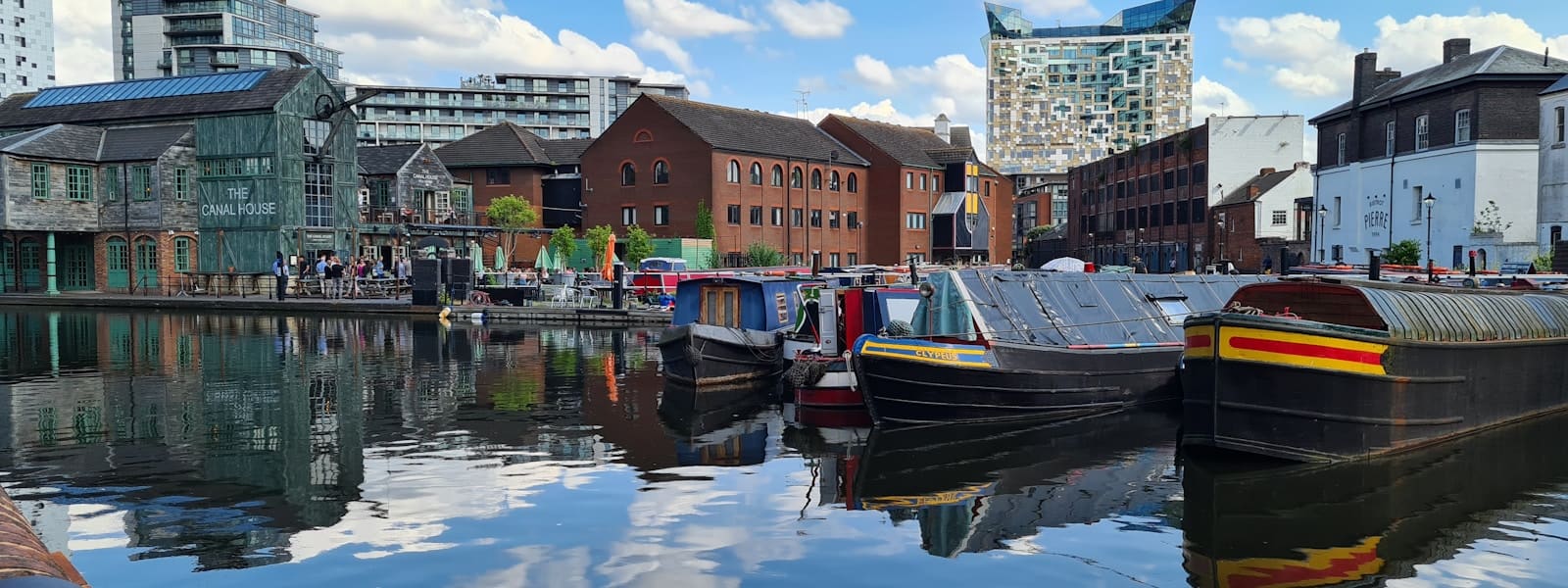 Narrowboats moored on the canal in central Birmingham